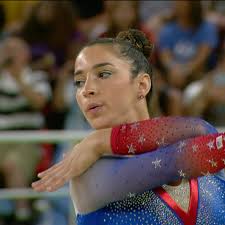 Aly Raisman performs to Red Poppy and Kalinka
