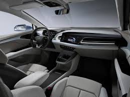 The standard leather interior and wood trim offer exceptional ambiance, while the electric drivetrain, aerodynamic design, and available acoustic glass all contribute to a quieter, more serene ride. This Electric Audi Costs Just 45 000 Q4 E Tron Evbite