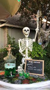 Halloween, the spookiest holiday of the year, is the time to boost your home's curb appeal. Skeletons In The Garden Don T Drink The Koolaid Home Is What You Make It Halloween Outdoor Decorations Halloween Facts Diy Halloween Decorations
