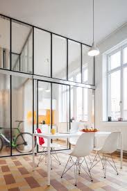 Glass Partitions Divide Up The Interior Spaces Of Apartments Created Within A Former School Building Interior Interior Architecture Design House Interior
