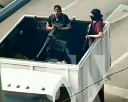 Video shot at the property shows him passing a handgun to an associate before emerging into a garage, fiddling with a black baseball cap before soldiers back him against the. Moment El Chapo S Son Is Busted And Ordered To Call Off Cartel Killings Before Being Freed In Botched Mexico Arrest Bid