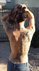 It can be around $1,750 or more to fill in a back armor tattoo with color since that can take up to 7. Back Tattoos That Asian Looking Chick