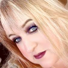 Dale and Kay Haudrich are adding much beauty to Monroe County with a field  of sunflowers which also helps farmers in Myanmar. They are inviting anyone  who wants to take pictures to