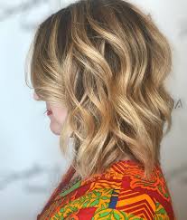 Understanding the curves of the head to cut the perfect face frame haircut. So You Want A Lob Haircut Aveda