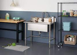 Stainless steel laundry sink with faucet and storage cabinet this glacier bay utility sink and storage this glacier bay utility sink and storage cabinet is a stylish and compact solution for any laundry room. Trinity 32 In X 16 In Stainless Steel Utility Sink With Pullout Faucet Costco