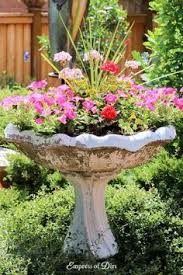 Bird Bath With Solar Light And Planter 8 Bold And Colorful Flower Pot Ideas Care Tips Bird Bath Garden Bird Bath Planter Garden Containers