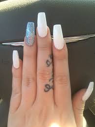 Coffin nails with cursive heart shape on white background. Simple Coffin Shaped Nails New Expression Nails