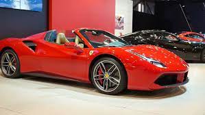 Research the ferrari 488 spider and learn about its generations, redesigns and notable features from each individual model year. Shutterstock