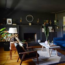 You may find that a piece of furniture lingering in your bedroom would work so much better in your living room or take a look in your loft or garage to see if any neglected pieces could be. 20 Gorgeous Black Living Rooms How To Use Black Walls Decor In Living Rooms Apartment Therapy