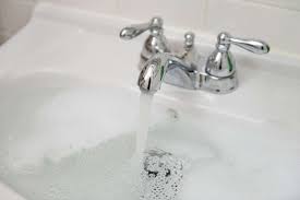 to clean a clogged drain with baking soda