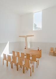 The Only Colour In The Space Comes From A Series Of Wooden Furniture Pieces All Designed By Siza Alvaro Siza Minimalist Architecture Sacred Architecture