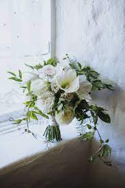 Rad In Love Brides Bouquet With Amaryllis Garden Roses Ranunculus And Jasmine Vine Green Wedding Flowers Ranunculus Wedding Ranunculus Bouquet