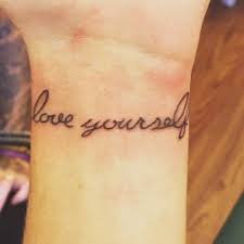 Wrist Tattoo Saying Love Yourself First On Michela Wrist Tattoos Quotes Small Quote Tattoos Love Yourself Tattoo