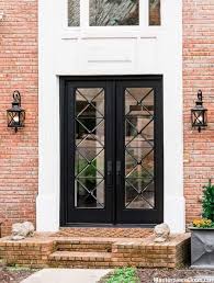 Glass doors are widely used as patio doors in modern homes, but more and more homeowners are choosing them for their exterior doors. Modern French Dark Double Front Entry Door French Doors Exterior Garage Door Design French Doors