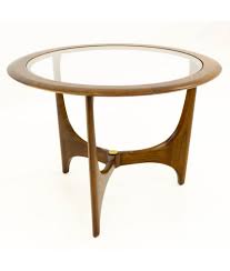 Table has iconic mcm lines with a smoky glass inset top. Adrian Pearsall For Lane Mid Century Walnut Glass Sculptural Round Side End Table