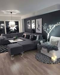 Grey is one of those colors that can completely change under different lights, so picking the perfect lighting for your space is important. 6 Beautiful Gray Living Room Ideas To Capture The Minimalist Look Dark Grey Living Room Black Living Room Small Living Room Decor