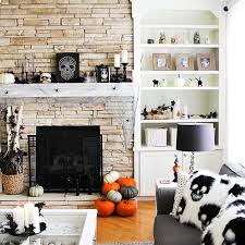 Ditch the cheap plastic pumpkins in favor of black candelabras, smoked glass goblets, and pumpkin tureens. Halloween Decorating Ideas A Pretty Life In The Suburbs