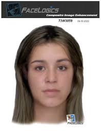 Unknown woman. Gen. In powassan July 15 1937 Barrett store in the background