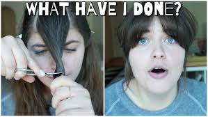 CUTTING MY HAIR!!!(BANGS)