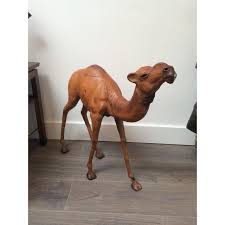 There will be a handle on the front of the saddle to help you hold. Vintage Leather Camel Statue Chairish