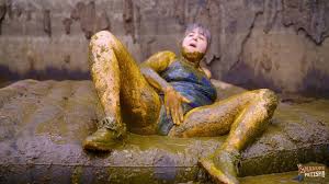 Diving in the Manure Pit - ManureFetish - Hot girl swims in cowshit