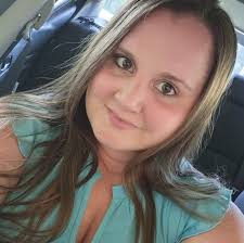 Tying red ribbons for faith and belief in God