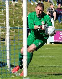 A sigh of relief from the Lochee 'keeper as he rushes backwards to prevent Andy  Leishman from scoring from a kick out from his own box.