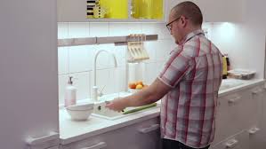 Maybe you would like to learn more about one of these? The Man In The Kitchen Stock Footage Video 100 Royalty Free 12976319 Shutterstock