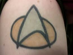 This tattoo is colored with bright yellow ink, and it not every star trek tattoo has to have a picture because this one is just the three famous words of the. Star Trek Tattoo By Joesaid8472 On Deviantart