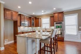 Mismatched Island In This Darker Stained Cabinet Kitchen Is Brilliant Dark Stained Cabinets Kitchen Kitchen Cabinets