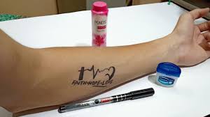 Peel the plastic back off the sheet, and press the tattoo into your skin. How To Make Temporary Tattoo Look Real Diy Tattoo With Pen Youtube