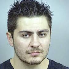 Denver homicide suspect surrenders