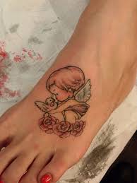 If you're looking for some baby footprint tattoo ideas, keep scrolling! 55 Baby Angel Tattoos Designs With Meanings