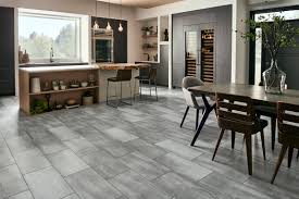 A large dining room featuring hardwood flooring and beige walls. Modern Contemporary Dining Room Greys Blacks Tile Stone Design Ideas Flooring America