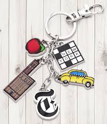 This Keychain Features Iconic Images Such As A Crossword Puzzle And The Original Times Tower New York Landmarks New York Times I Ny