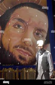 Dec 20, 2001; Kandahar, AFGHANISTAN; Lance Cpl. AJMAL ACHEKZAI (UT) talks  in Pashtun with Afghans @ Kandahar Airport. Achekzai, who was born in  Kabul, serves as a translator for the the 15th