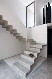 U Shaped Concrete Staircase Casa Garcias By Warm Architects Up Interiors Concrete Staircase Staircase Design Modern Staircase