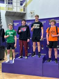 Jackson Finke wrestles to a 4th...