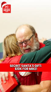 School custodian breaks down crying after opening gift from Secret Santa.