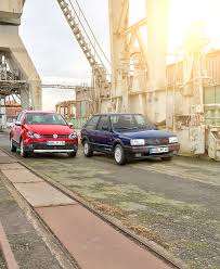 The Red Volkswagen Polo Cross And Its Predecessor The Blue Polo Ii Gt G40 Shot In An Unusual Location A Dry Dock In The Vw Polo Volkswagen Volkswagen Polo