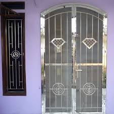 Pintu teralis minimalis kasa nyamuk/stainless dan besi. Bengkel Las Bogor Pembuatan Pagar Kanopi Teralis