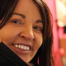 What home charger is recommended for an electric vehicle?