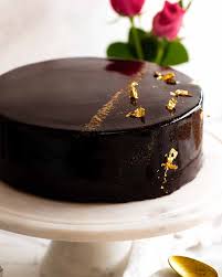 Now that your cake is wrapped in chocolate, you can finish decorating the cake. Chocolate Mirror Glaze Recipetin Eats