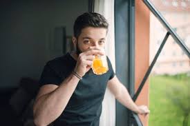 Browse 911 black man drinking juice stock photos and images available, or search for mom playing basketball or juicer to find more great stock photos and pictures. Young Man Drinking An Orange Juice At The Window Stockphoto