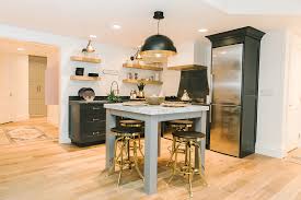 It also incorporates a spiral wine cellar. Basement Kitchen Reveal Project Modern Family Stagg Design