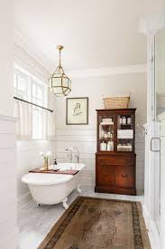 There are green tiles, green vanity, and green area rugs the adorn the white tiles of the floor. 20 Amazing Farmhouse Bathrooms With Rustic Warm For Creative Juice