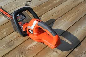 It is comfortable to hold and has a nice soft grip that allows you to maneuver the tool with ease. Black And Decker 20v 22 In Lithium Hedge Trimmer Lht2220 Review Tools In Action Power Tool Reviews