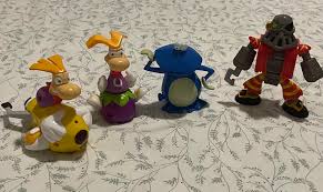 I finally got my hands on some Rayman toys!!! Theyre Happy Meal ones and  promoting one of my fav games ever Rayman 2 : rRayman