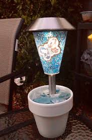 Solar Table Light Idea 1flower Pot Pebbles Or Marbles As A Filler 1 Solar Light A Perfect Light For Y Solar Lights Garden Solar Lights Outdoor Solar Lights