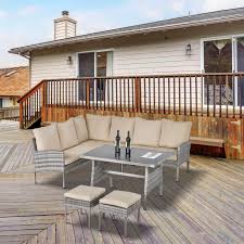 Check spelling or type a new query. Outsunny 6 Piece Outdoor Patio Rattan Dining Table Set With Sectional Sofa And Two Ottomans In Khaki Wholesale Furniture Brokers Canada